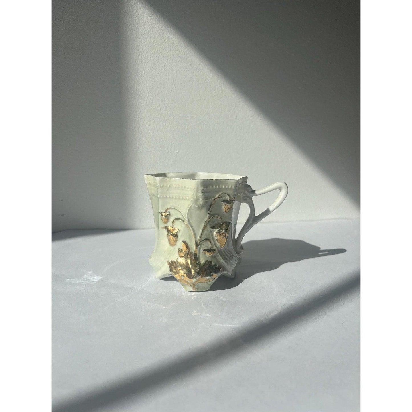 Antique hand painted porcelain cup