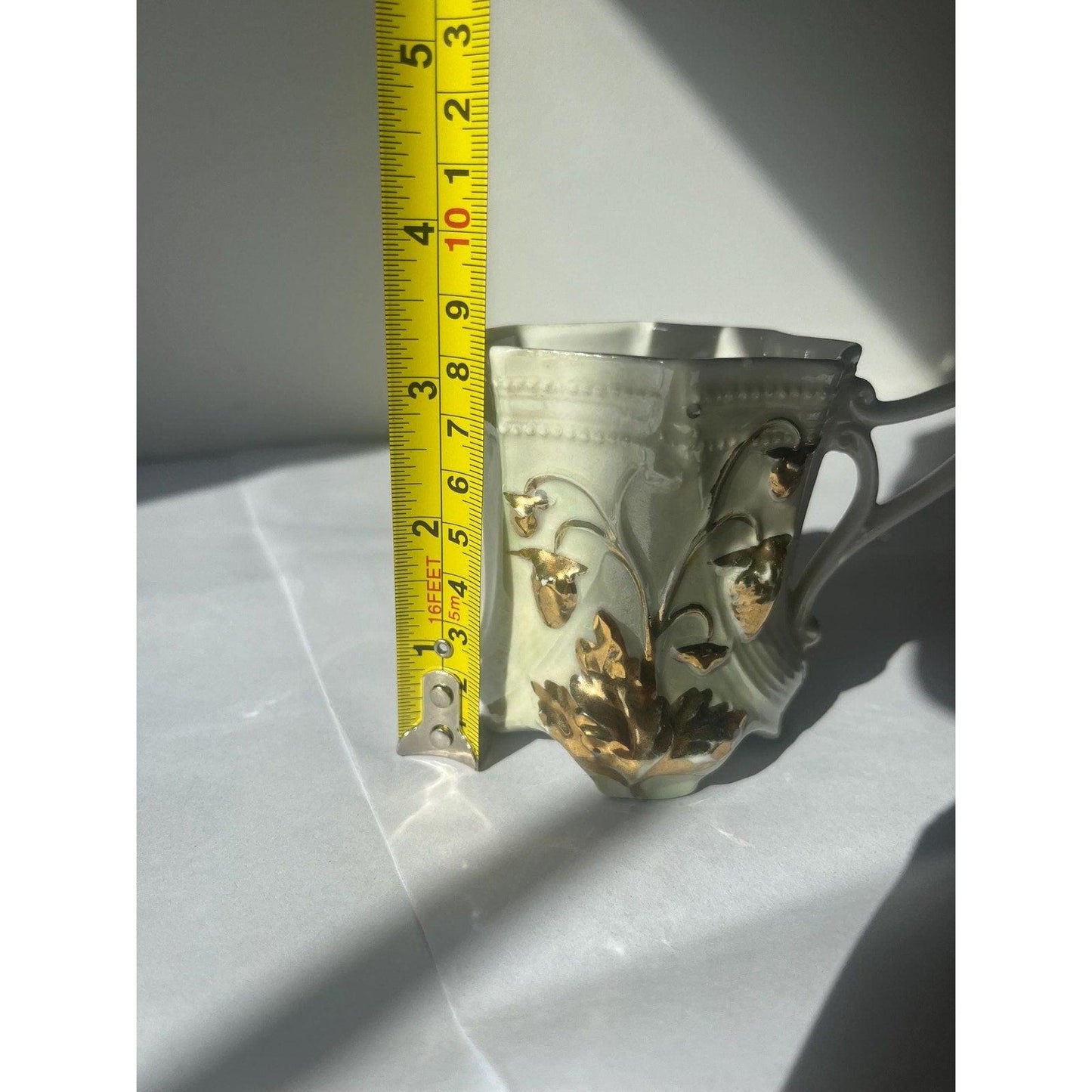 Antique hand painted porcelain cup