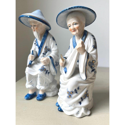 Pair of vintage porcelain Japanese musician figurines